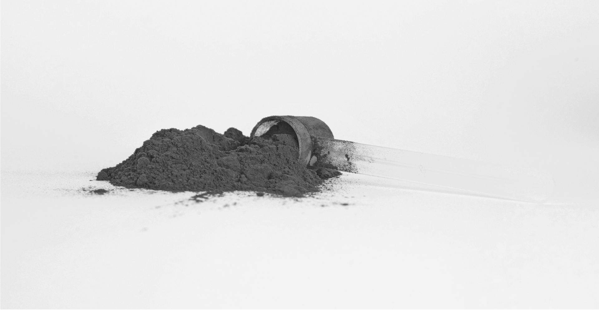This image of a protein powder scoop illustrates our discussion topic: Fitness counterfeits and online scams from jerseys to protein powder, and how brands can fight back/