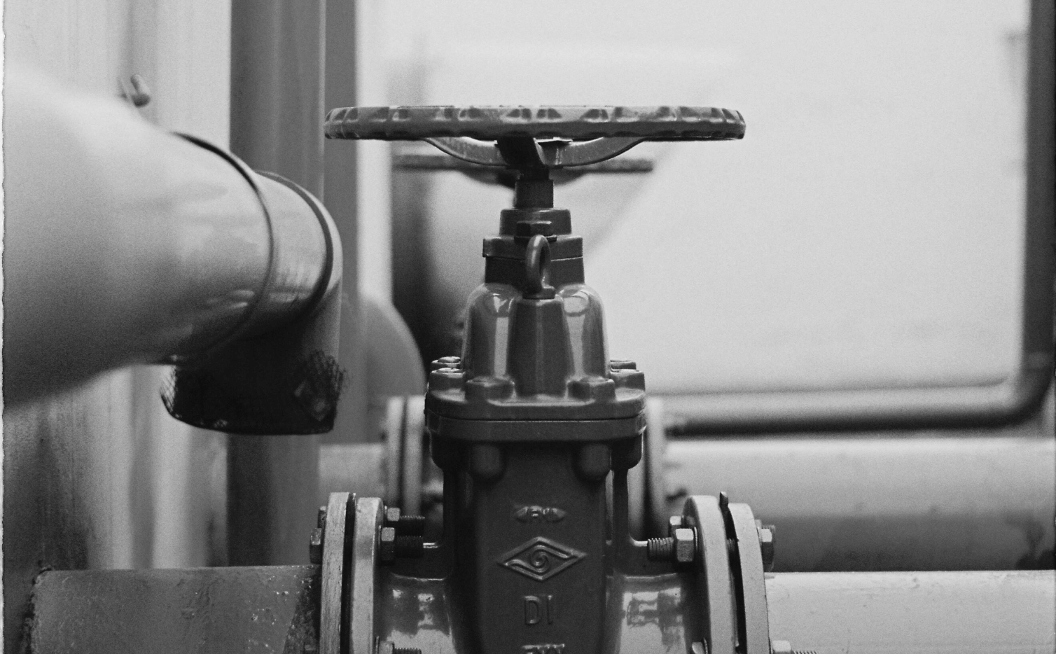 This image of a pipe with a valve in it illustrates our discussion topic: leaks and breach protection with EBRAND.
