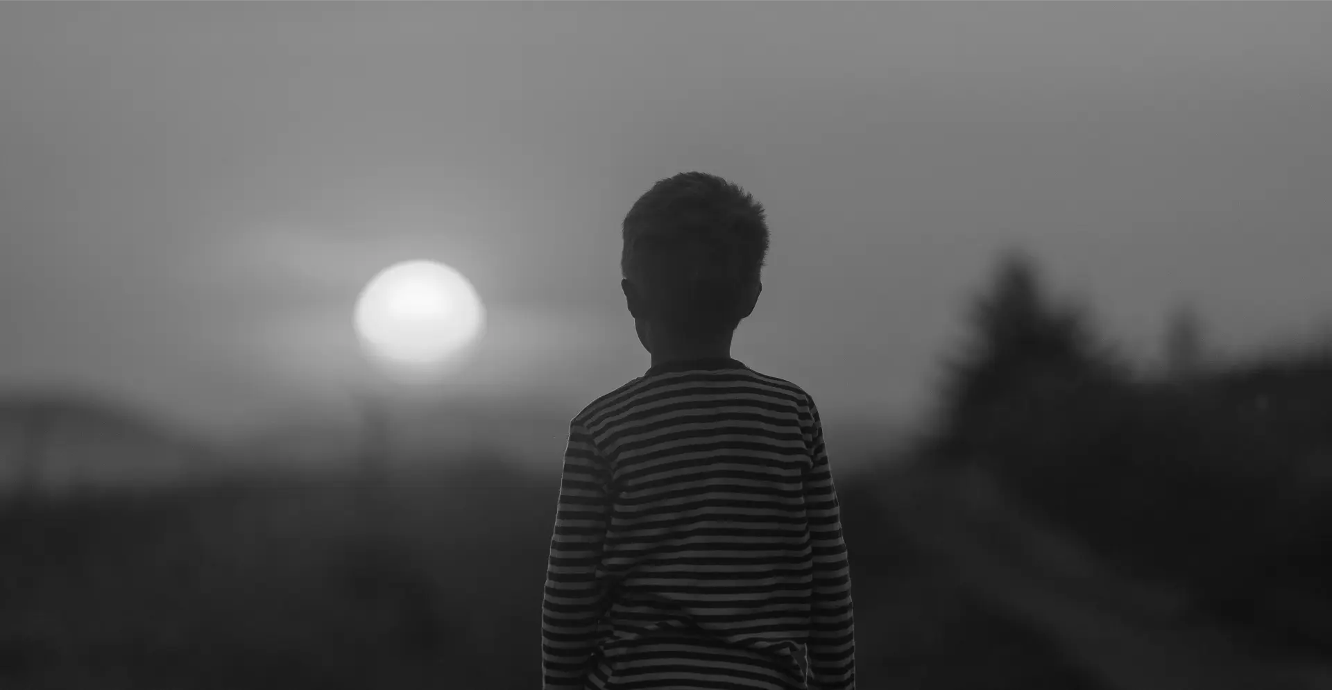 This image of a child looking into the sun illustrates our discussion topic: how to protect your future across brands, domains, and digital risk.