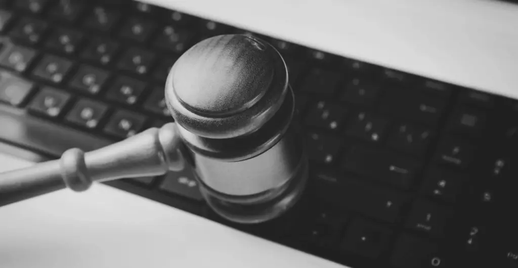 This image of a gavel hitting a keyboard illustrates our discussion topic: IP Protection and our legal advisor's lessons from Spain.